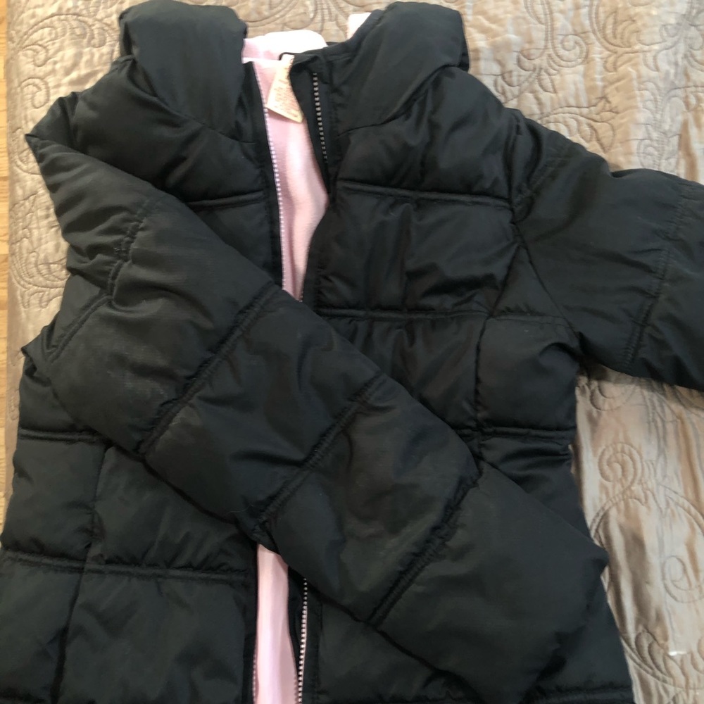 Black puffer jacket with pink fleece lining
